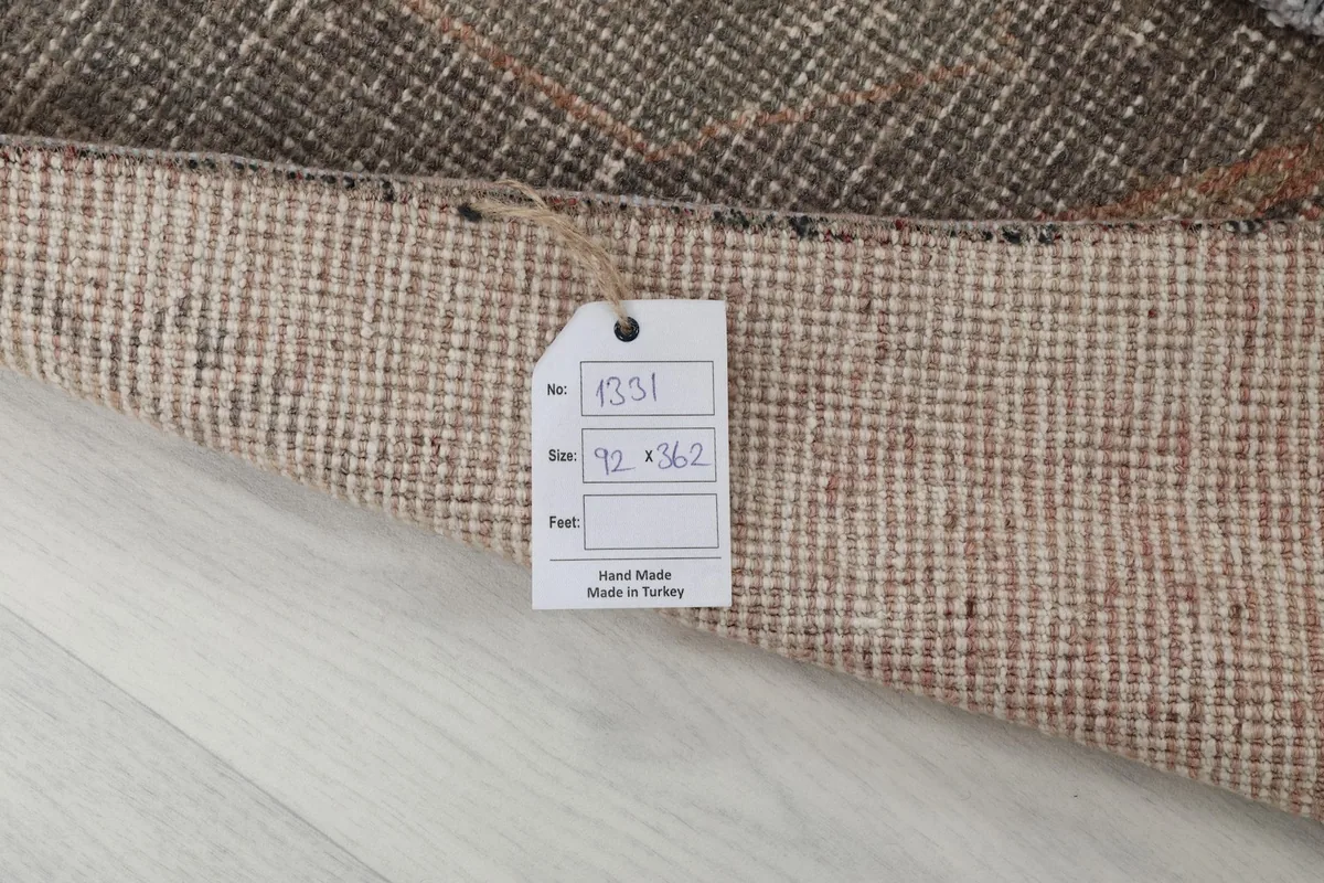 Label attached to the back of the rug, indicating its size and origin from Turkey.