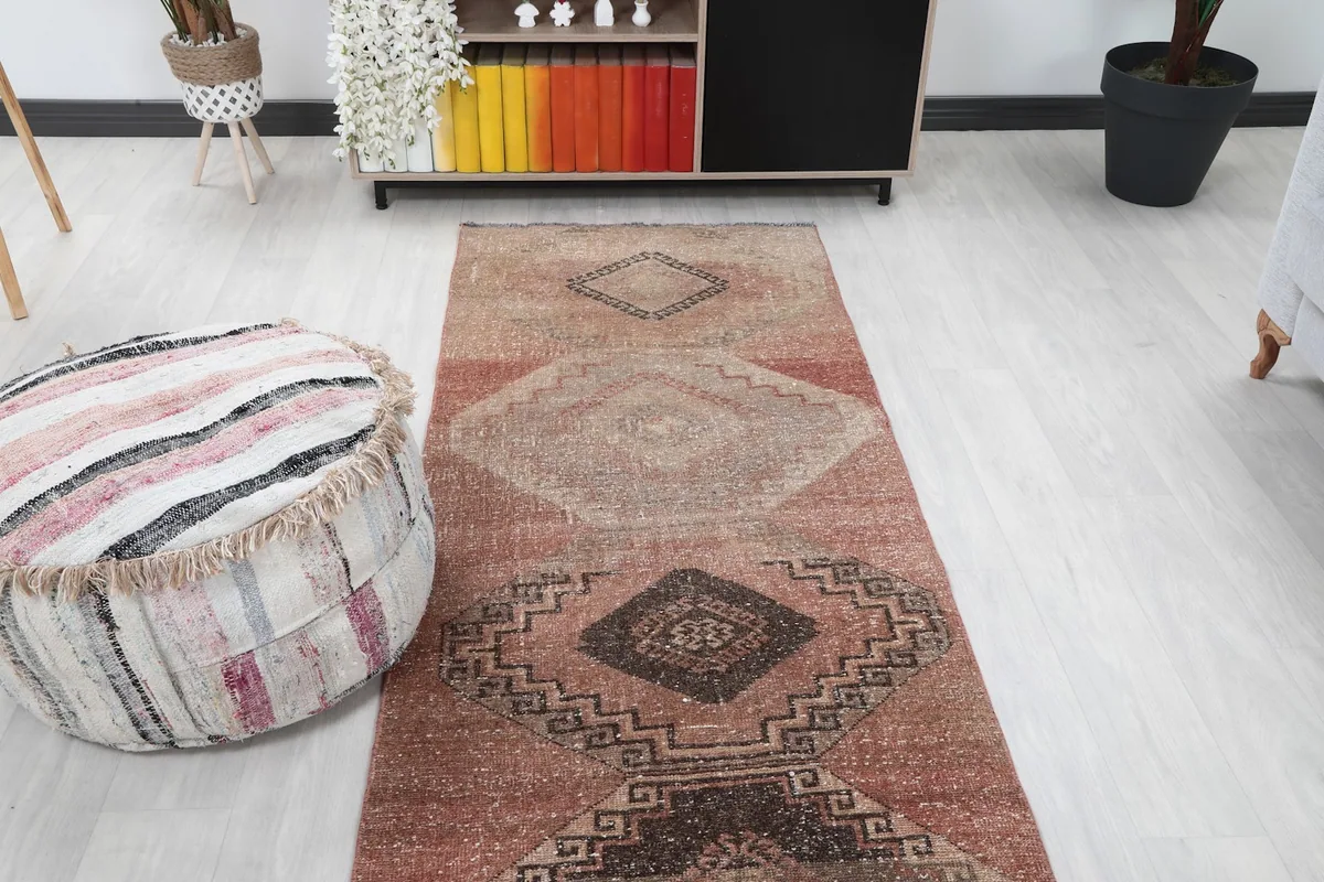 Overhead view of the runner rug in a room setting, focusing on the central and upper sections