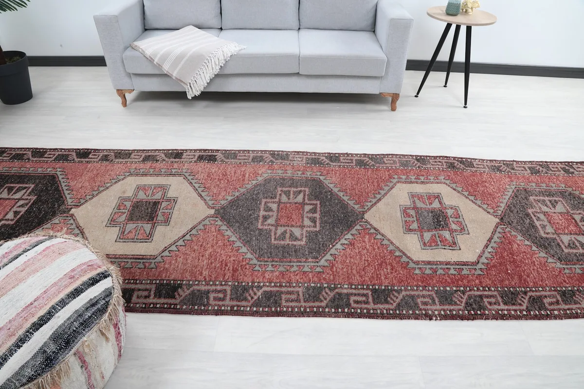 Long view of the runner rug in a room, emphasizing its length and suitability for hallways.