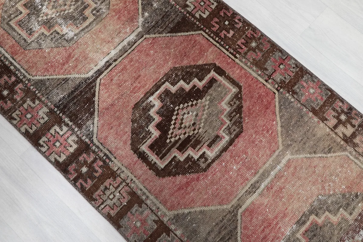 Overhead angle showing a section of the runner with its distinct octagonal medallions