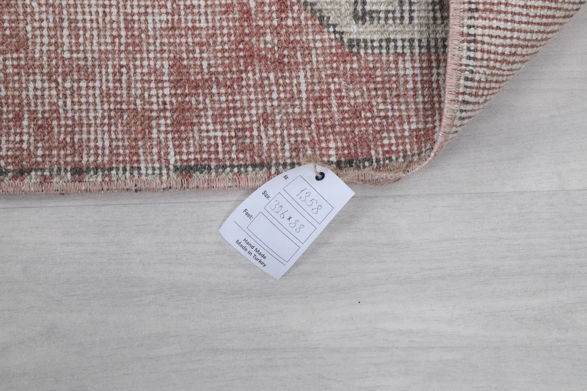 Tag displaying the dimensions and product number of the 2'11" x 10'8" vintage Anatolian runner.