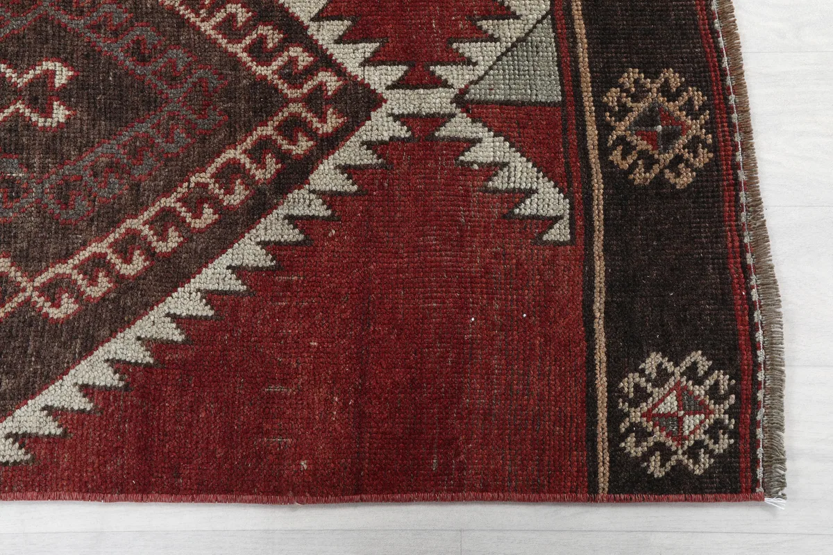 Rustic Red Tribal Diamond Runner, close-up of the border design and main red field