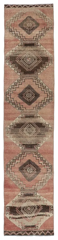 Full top view of the vintage rose geometric Anatolian runner rug on a white background