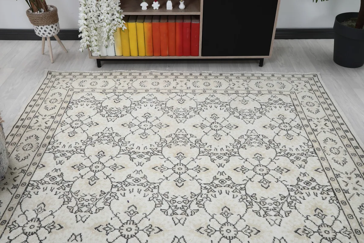 Overhead view of the rug in a room setting, capturing its full pattern and color