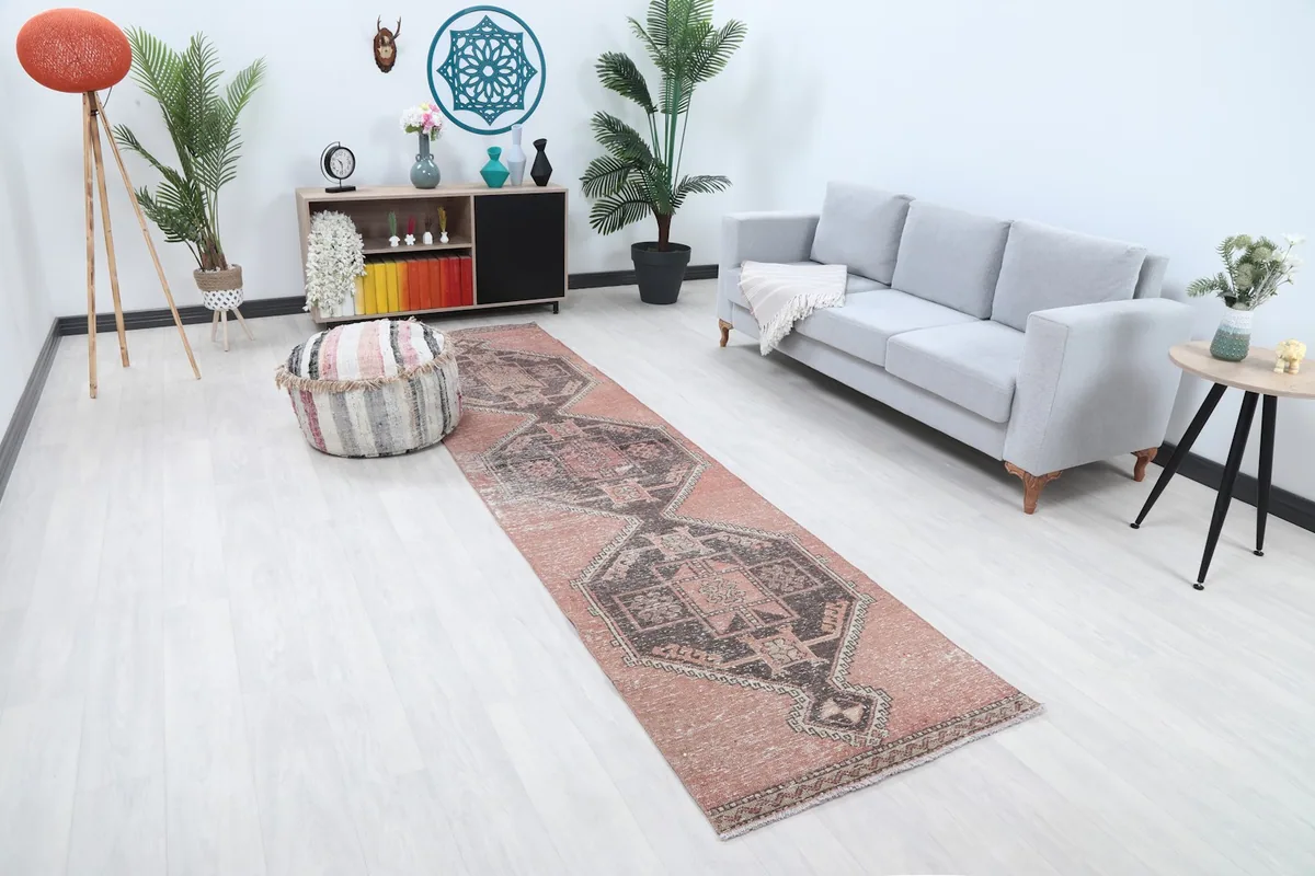 Angle view of the runner rug in a room, showing its length and how it complements the decor.