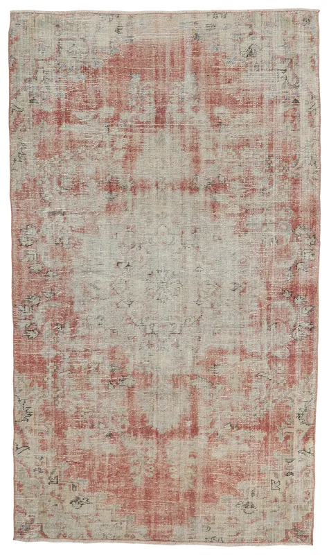 Full overhead view of the 4'9" x 8'4" vintage rose and beige Anatolian area rug