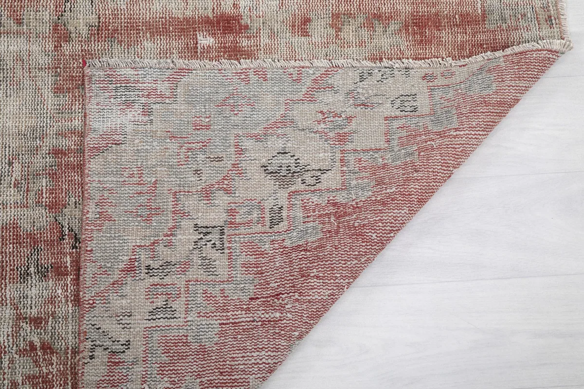 Another folded view, highlighting the construction and the reverse side of the rug