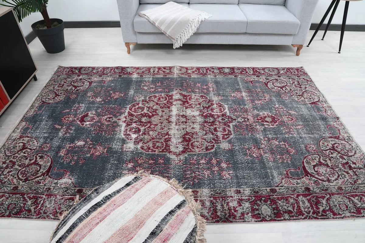 Full room view from a higher angle, showcasing the rug's overall impact.