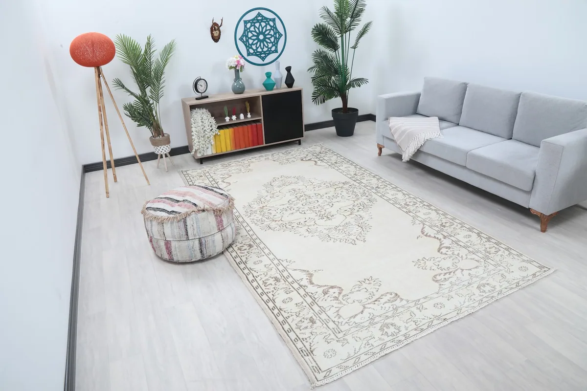 Angle view of the ivory area rug in a modern living space
