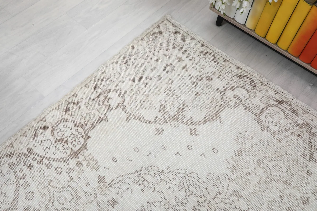 Corner perspective of the rug, showing the intricate details of the border and field