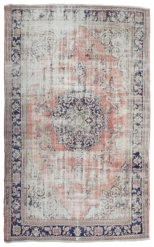 Faded Rose Medallion Vintage Rug, full top view showing its distressed rose field and navy border.