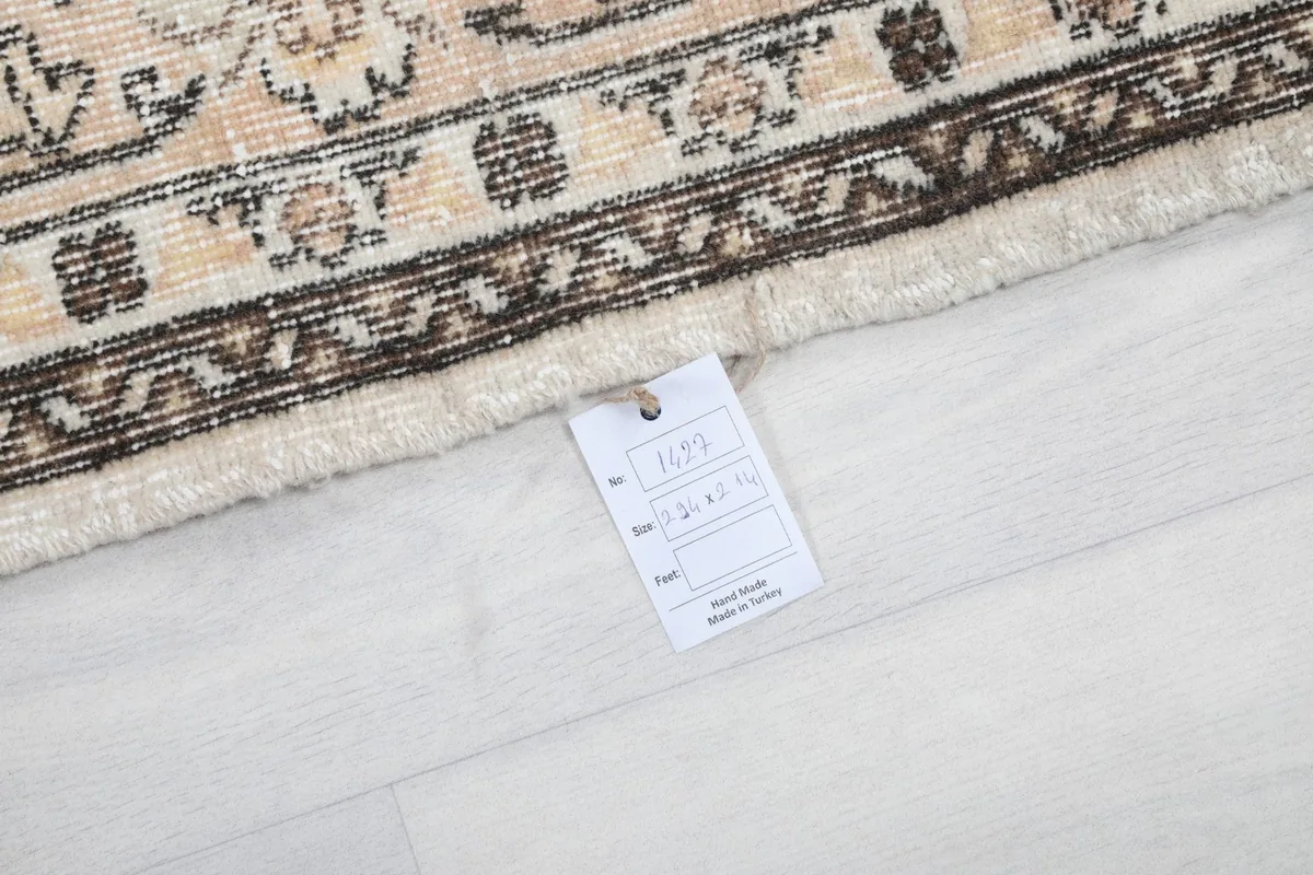Close-up of the rug's tag, indicating its unique product number and origin