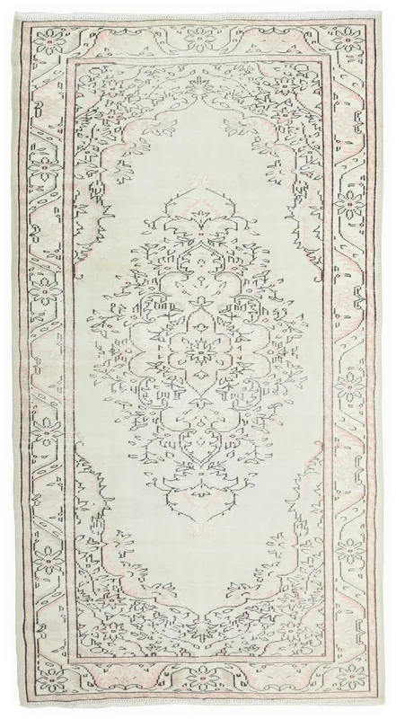 Full overhead view of the ivory and rose vintage Anatolian medallion rug on a white background.