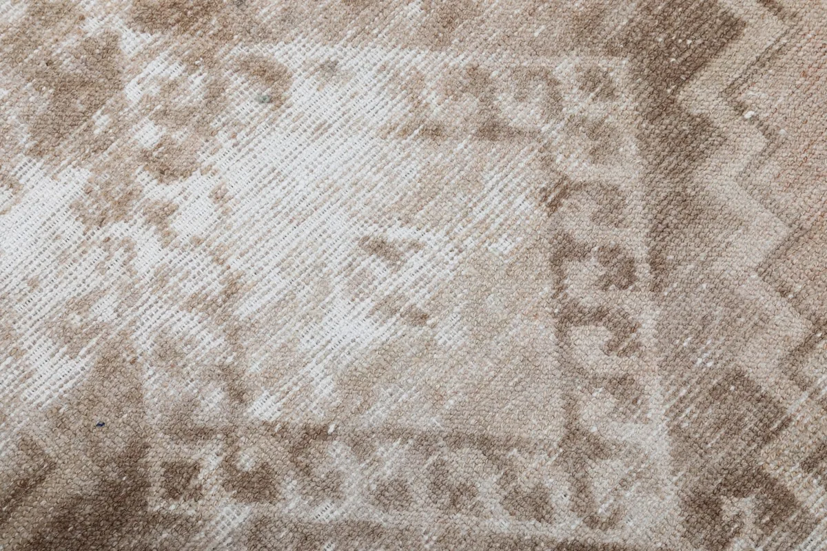 Texture detail showing the hand-knotted wool pile and subtle color variations.