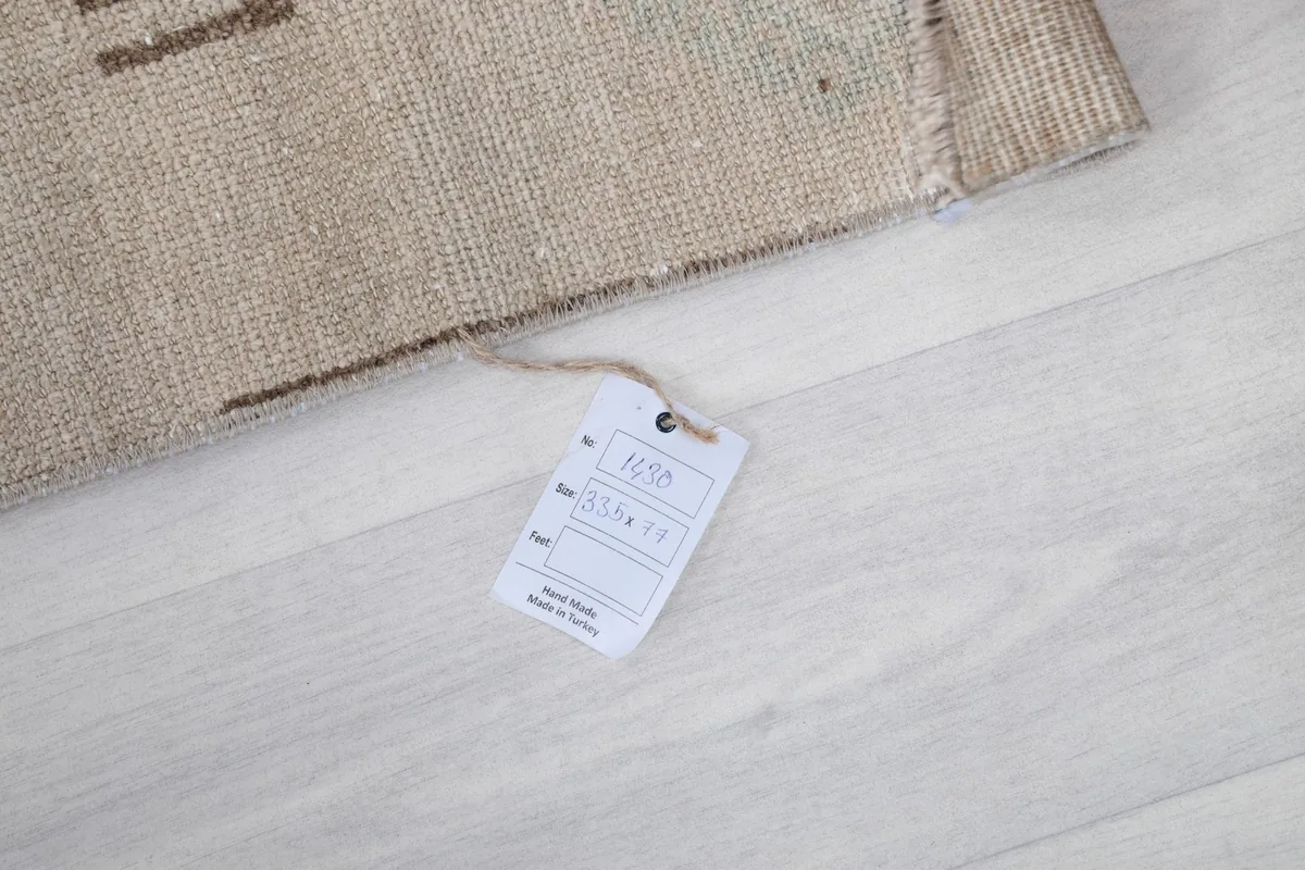 Product tag attached to the back of the rug, showing origin and details.