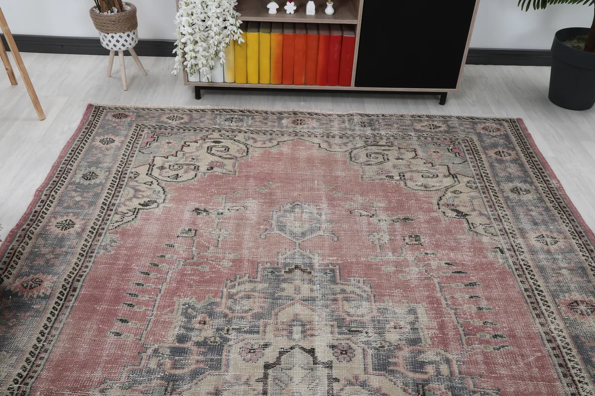 Rose Medallion Anatolian Rug from a wider angle in a room, capturing its full design.
