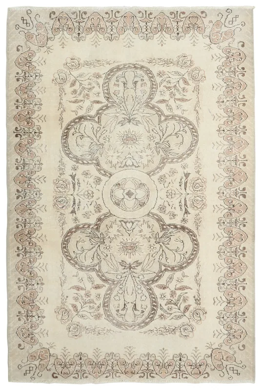 Full overhead view of the 5'8" x 8'6" ivory and rose vintage Anatolian rug