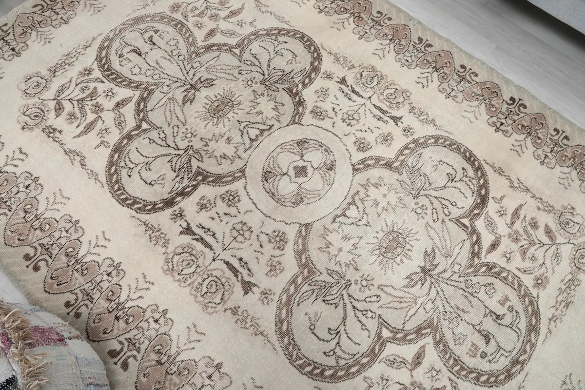 Overhead angle showing the central medallion and surrounding floral motifs
