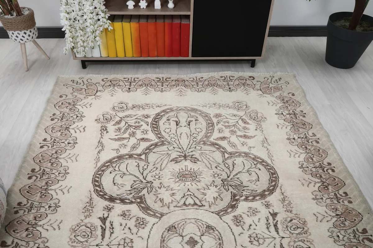 Overhead room view highlighting the rug's full design and colors in a living space