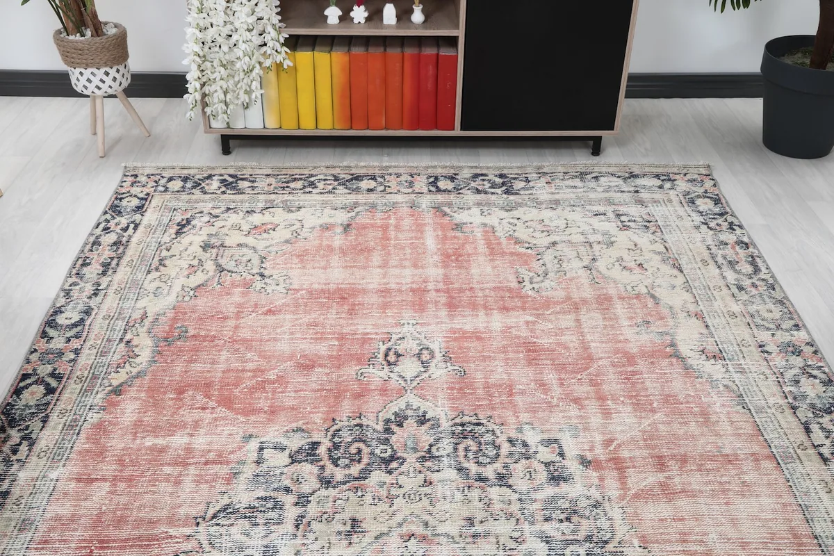 View of the rug from another angle in the living room, showing the full design.