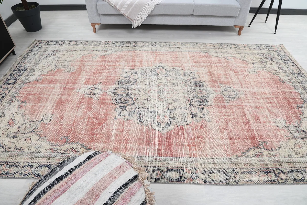 Overhead view of the rug in the living room, showing the full medallion and border.