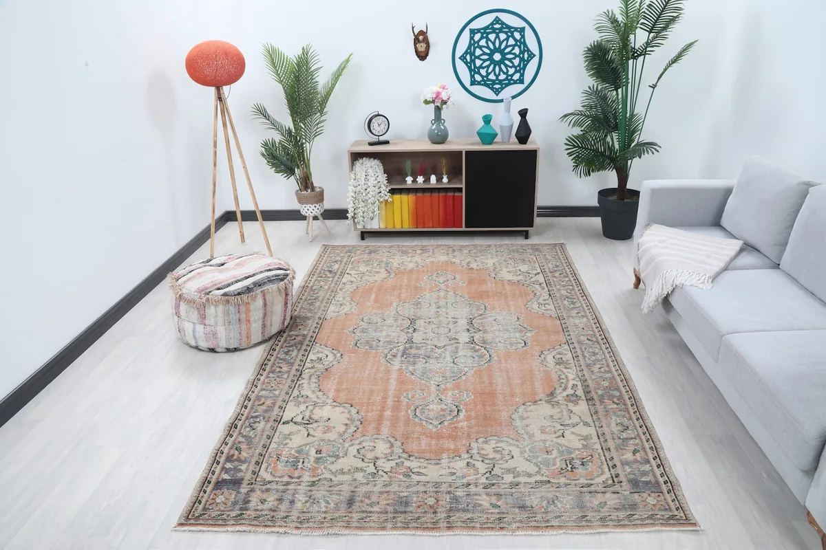 Vintage Anatolian rug displayed in a bright living room setting