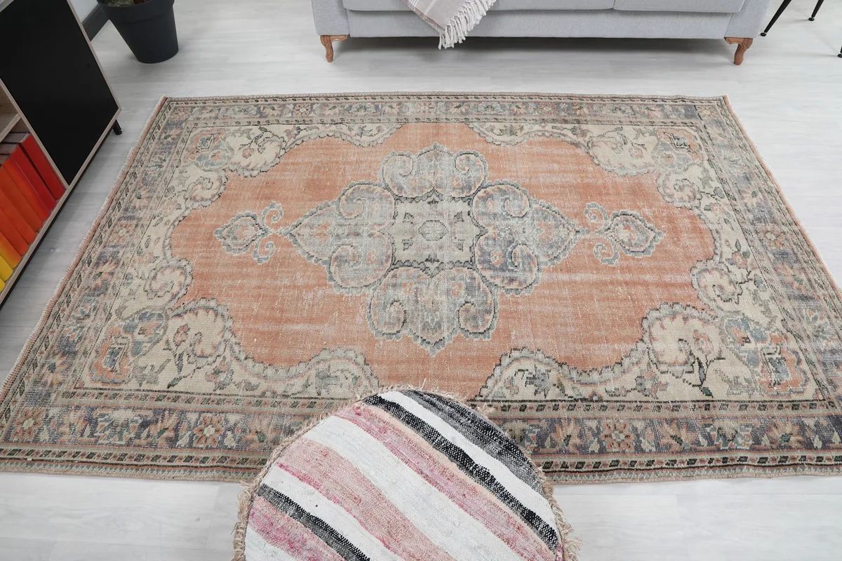 Wide room view of the rug, showcasing its overall size and color balance