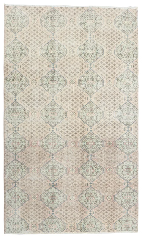 Full overhead view of the 6'6" x 9'3" rose and gray geometric vintage Anatolian area rug on a white background.
