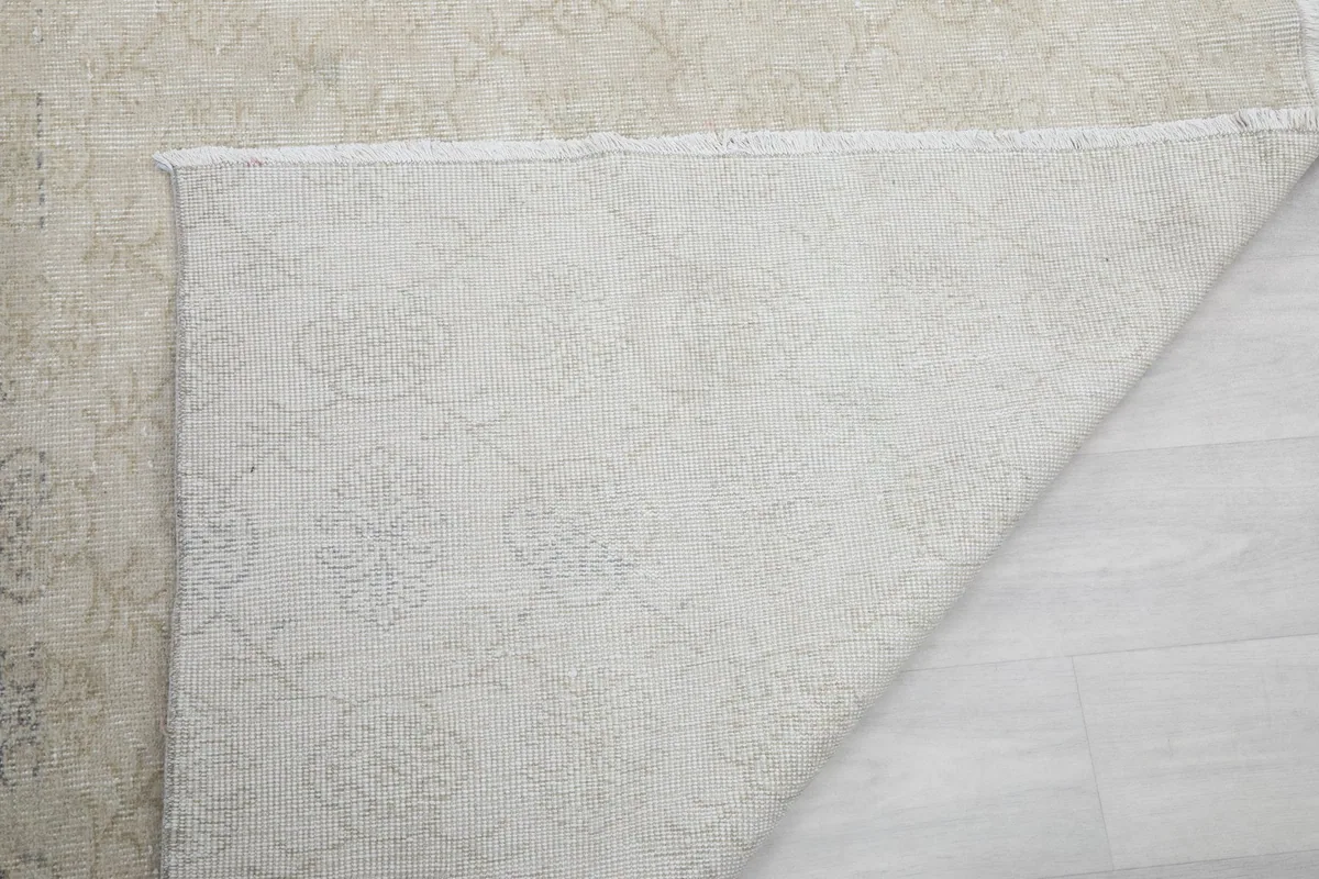 Another view of the rug's back, showing the consistent hand-knotted construction.