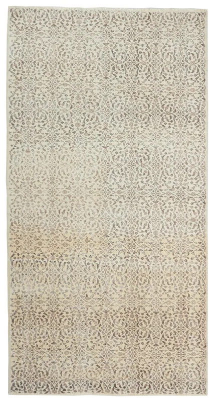 Full top view of the vintage ivory and gray Anatolian area rug with floral patterns