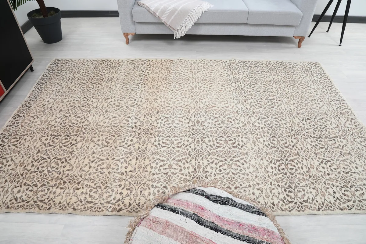 Frontal view of the rug in a room, showing its full width and subtle color transitions