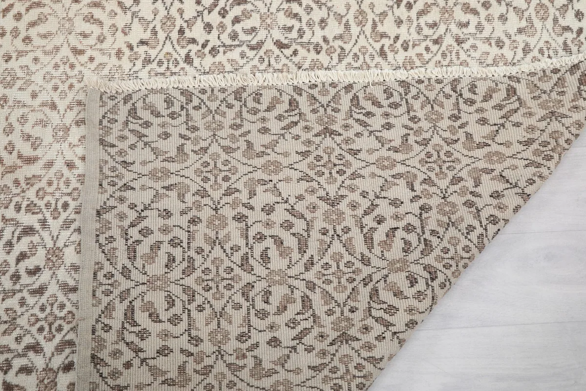Close-up of the rug's reverse side, showing the dense knotting and craftsmanship