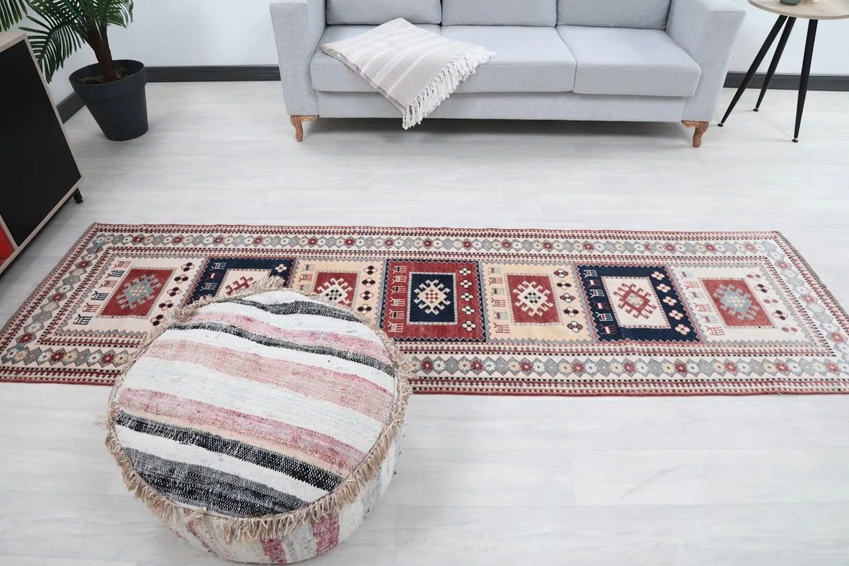 Full room view of the runner rug, showcasing its scale and design in a spacious setting.