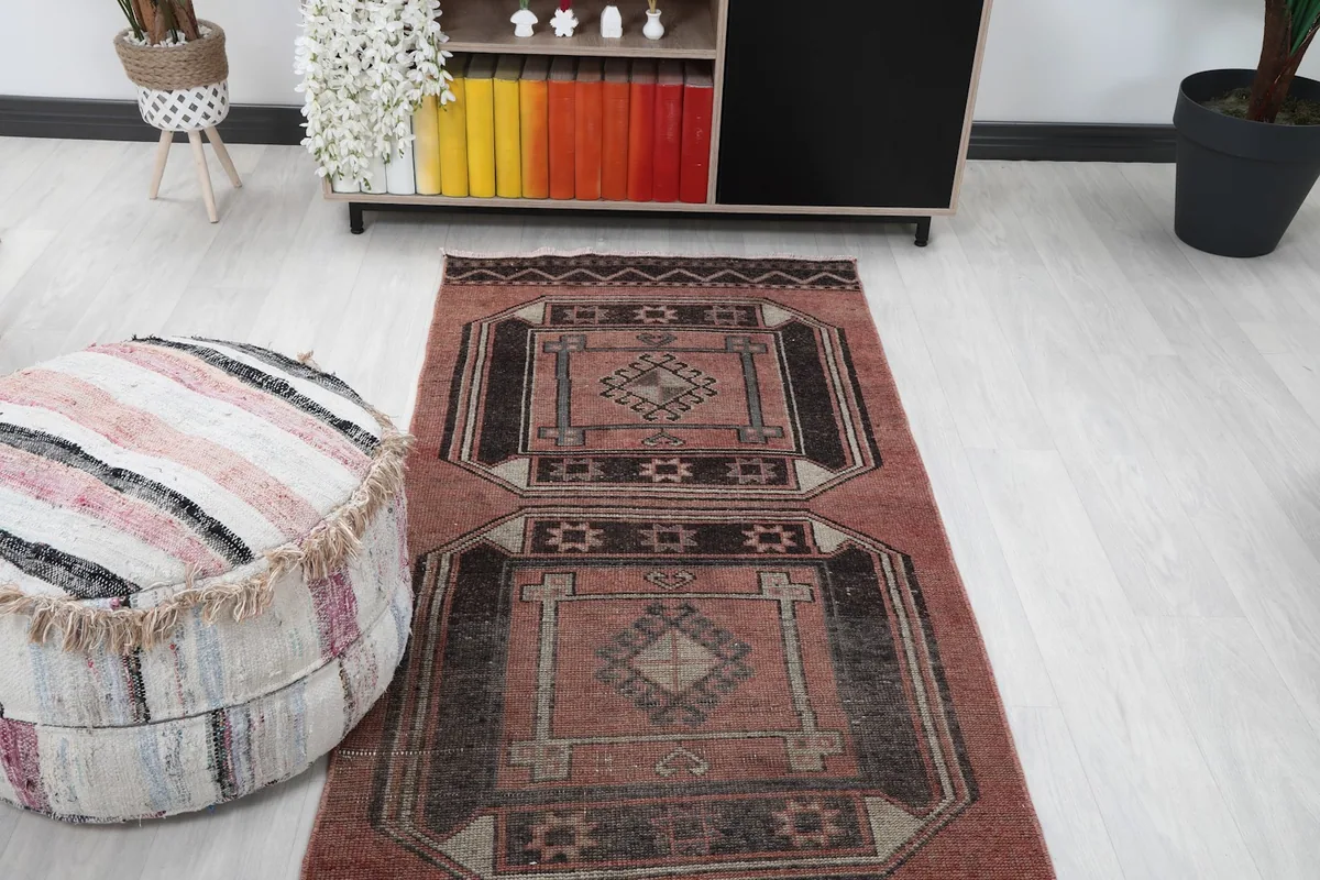 Overhead perspective of the runner rug in a room setting, showing its interaction with furniture.