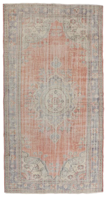 Full overhead view of the Faded Rust Medallion Area Rug on a white background
