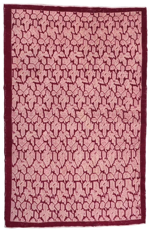 Top view of a rose and red geometric vintage Anatolian area rug