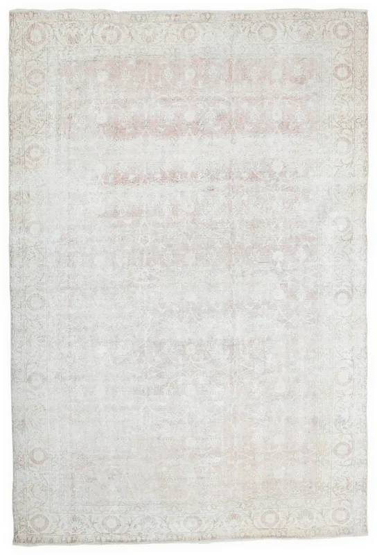 Full overhead view of the beige and faded rose vintage Anatolian area rug