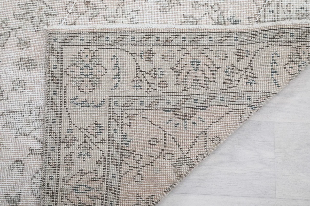 Close-up of the reverse side of the rug, revealing the knotting and foundation