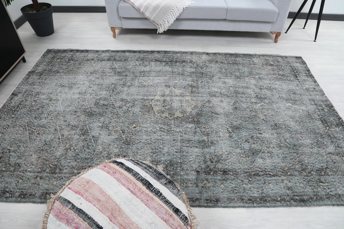 Overhead view of the rug within the room, showcasing its overall proportion