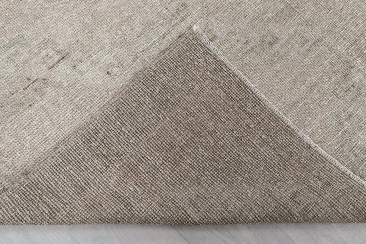 Underside of the hand-knotted wool pile on cotton foundation of the vintage runner
