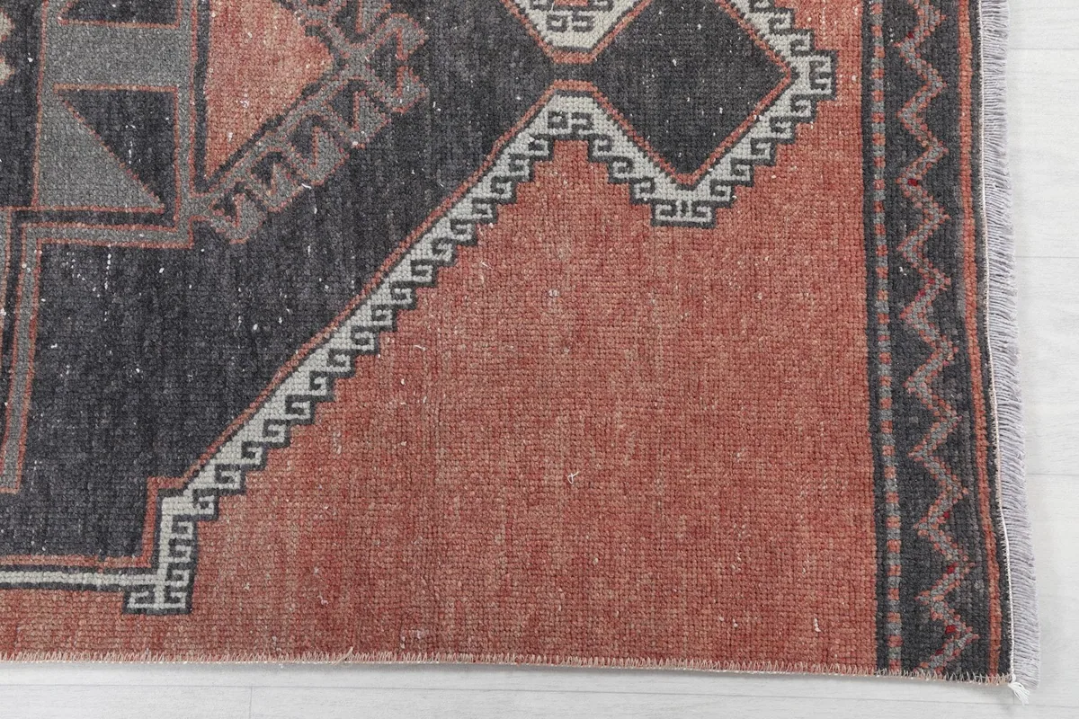 Detailed view of the rust field and border, showing the texture and subtle color variations.