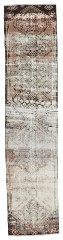 Full overhead view of the 2'8" x 12'2" gray and brown geometric vintage runner rug