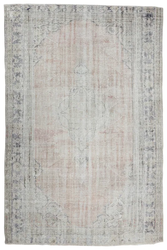 Full overhead view of the vintage rose and gray Anatolian rug