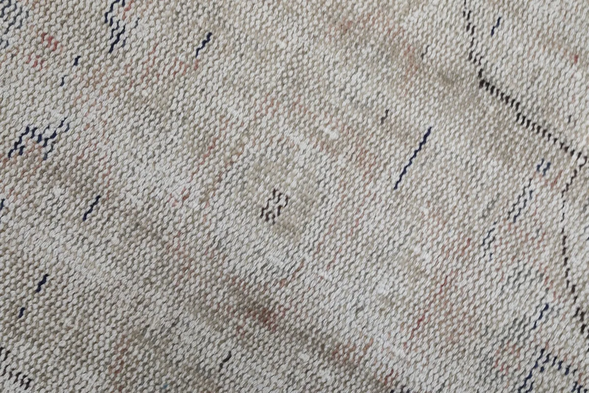 View of the hand-knotted cotton foundation on the back of the rug