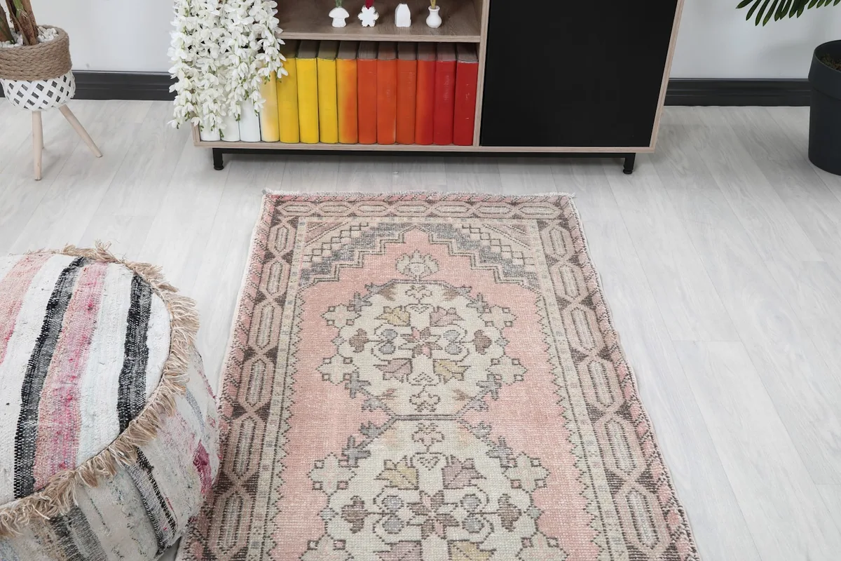 Overhead view of the runner rug placed in a room, showing its length in a hallway setting