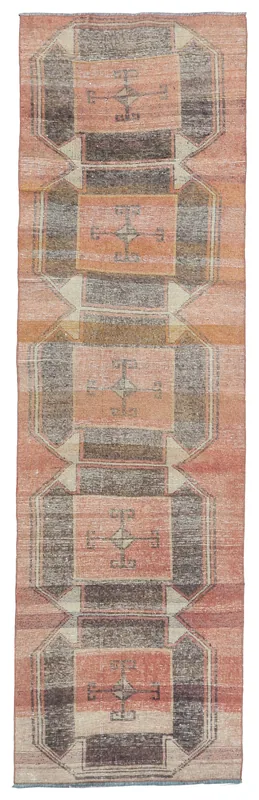 Full overhead view of the vintage orange and charcoal geometric runner
