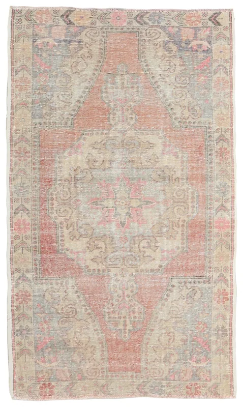 Full top view of the vintage rust and beige Anatolian area rug on a white background