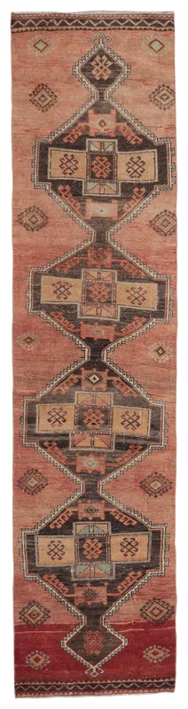Full overhead view of the 2'11" x 12'6" vintage rose Anatolian runner rug