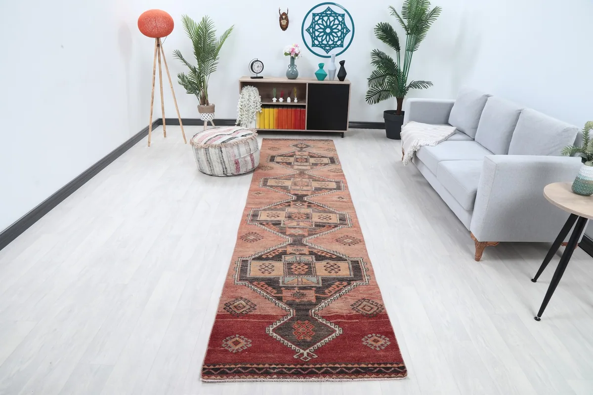 Vintage rose Anatolian runner rug in a modern living room setting