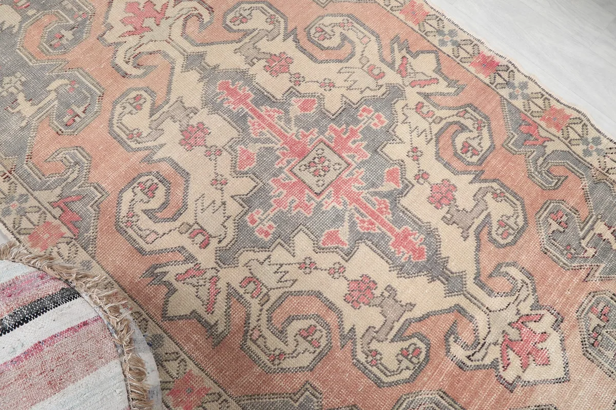 Overhead angle of the rug's central medallion and surrounding patterns